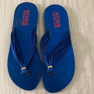 Michael Kors royal blue flip flops